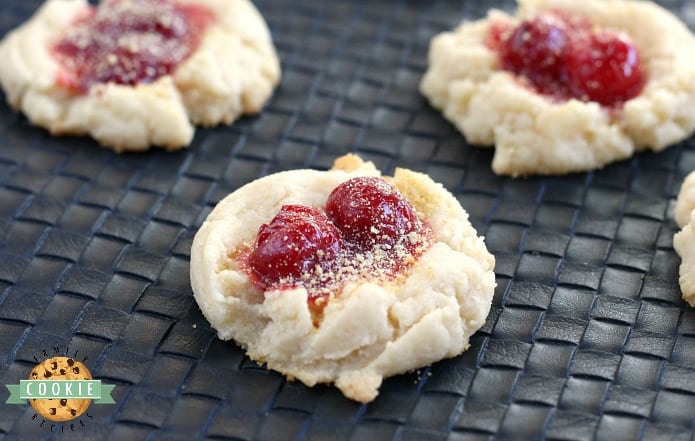 Cherry Cheesecake Cookies have cream cheese and cheesecake pudding in them, are topped with a little bit of cherry pie filling and then sprinkled with graham cracker crumbs!