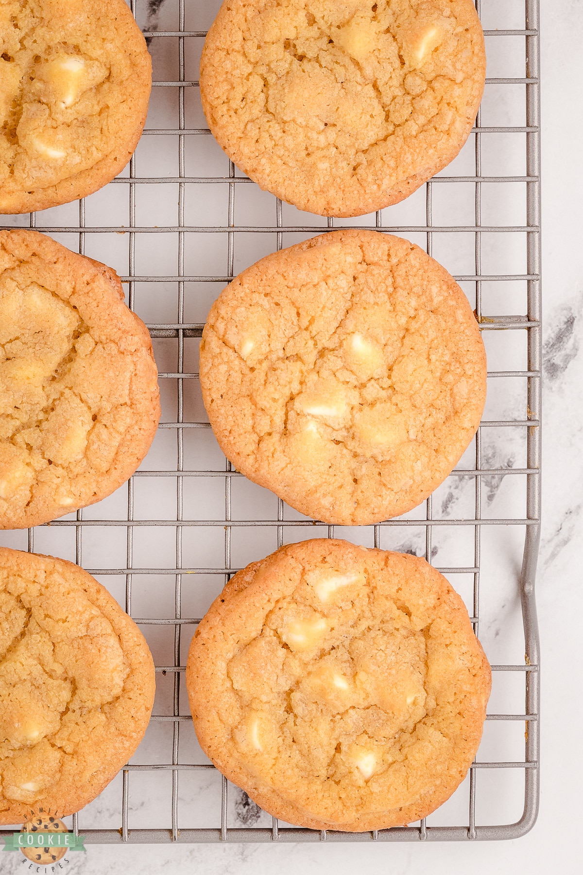 mrs fields white chocolate chip cookies on a cooling rack