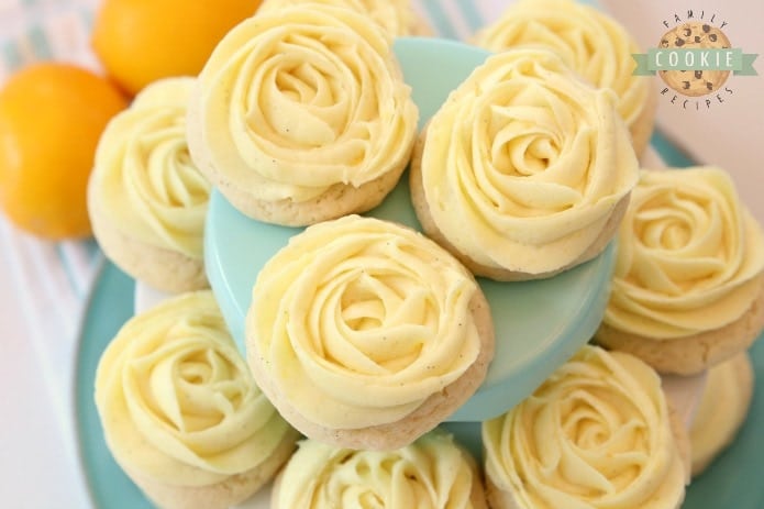 Frosted Lemon Sugar Cookies made by adding fresh lemon juice and zest to a simple sugar cookie dough. No rolling out or chilling necessary! Just bake and top with a bright lemon buttercream frosting. Easy Lemon Cookies piped with a super simple rosette so they taste incredible and they're pretty too! My all-time favorite Sugar Cookie recipe!