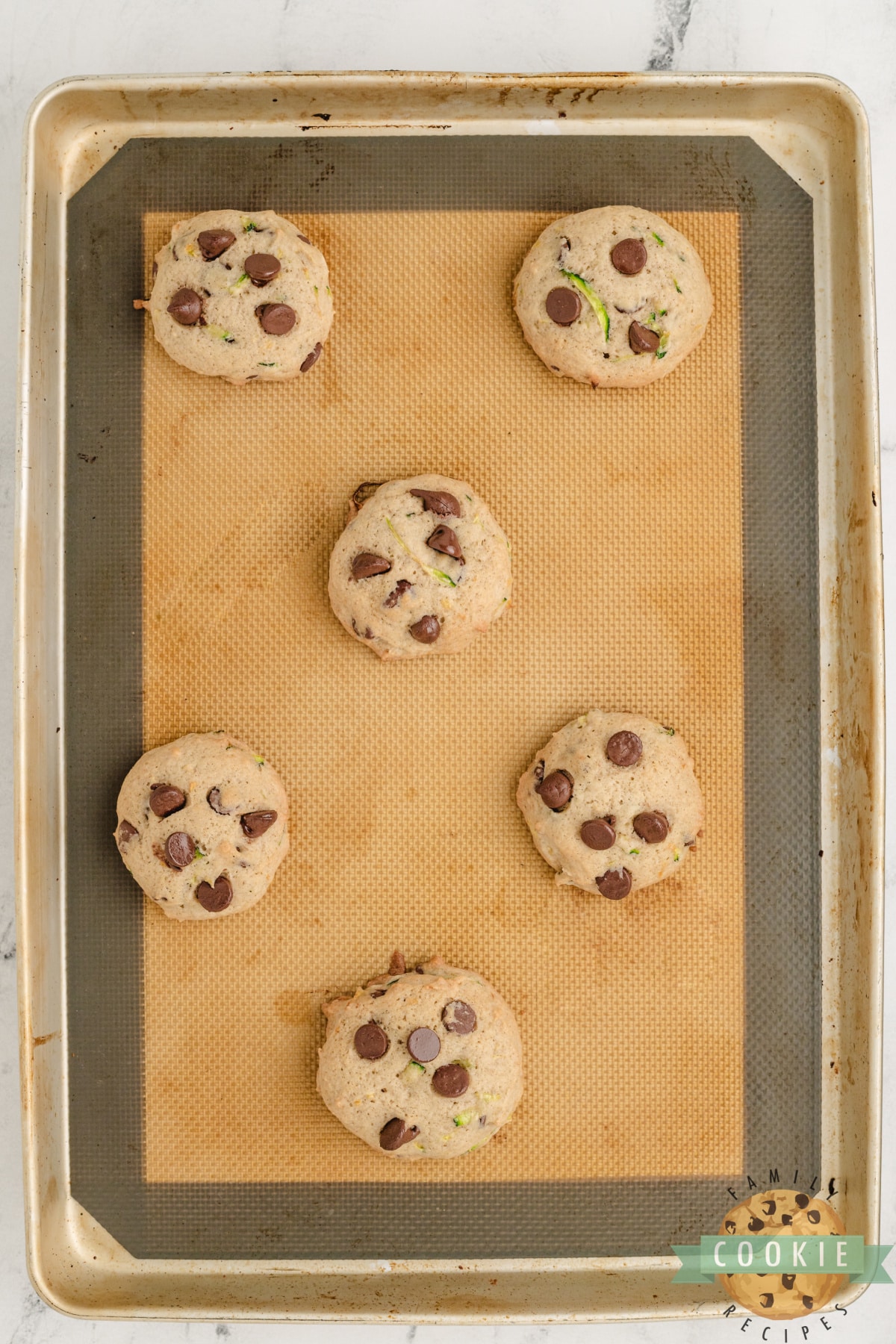 Baked cookies on cookie sheet. 