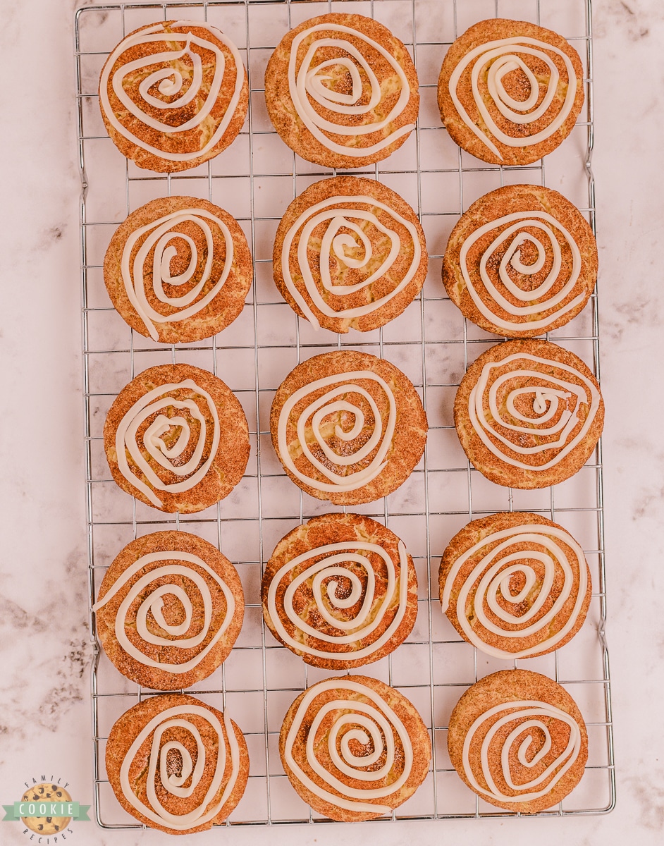 cinnamon roll snickerdoodles on a cooling rack
