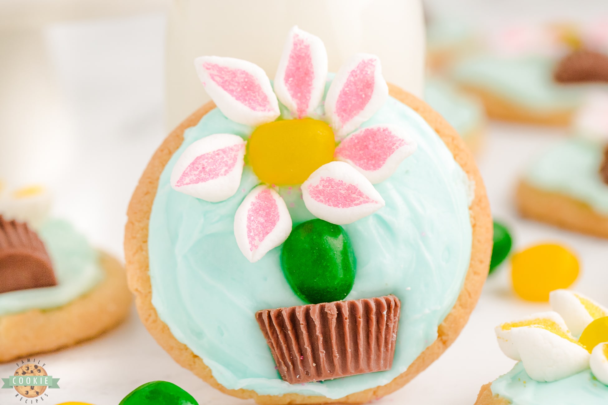 frosted sugar cookie with marshmallow flower