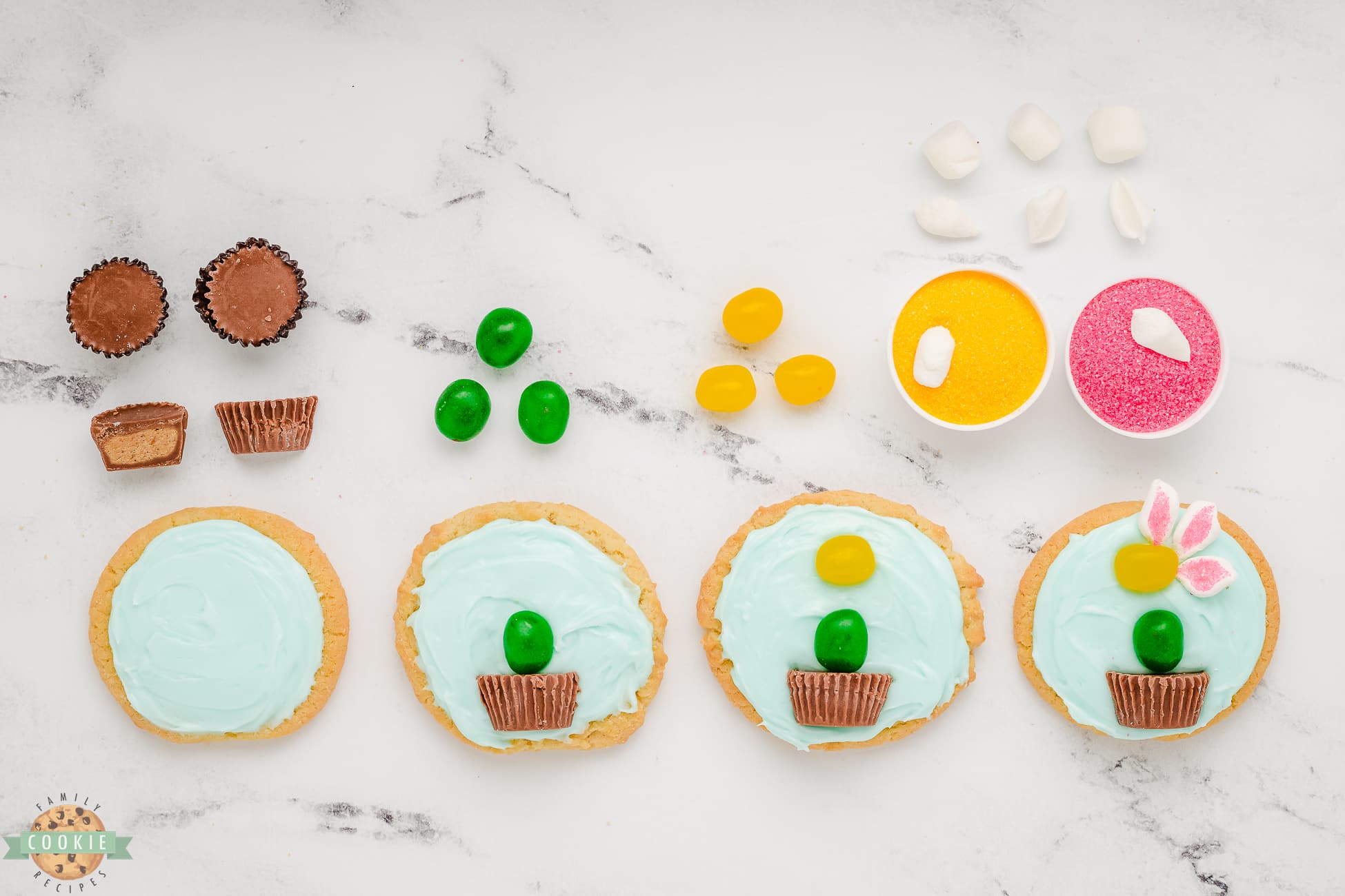 putting together marshmallow flowers on sugar cookies