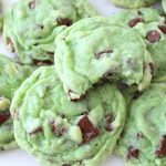 Mint Chocolate Chip Cookies made by adding mint extract & chocolate chips to a delicious pudding cookie dough. This chocolate chip cookie recipe is perfect for those who love mint chip ice cream. Our Mint Chocolate Chip Cookies are great for holiday baking!