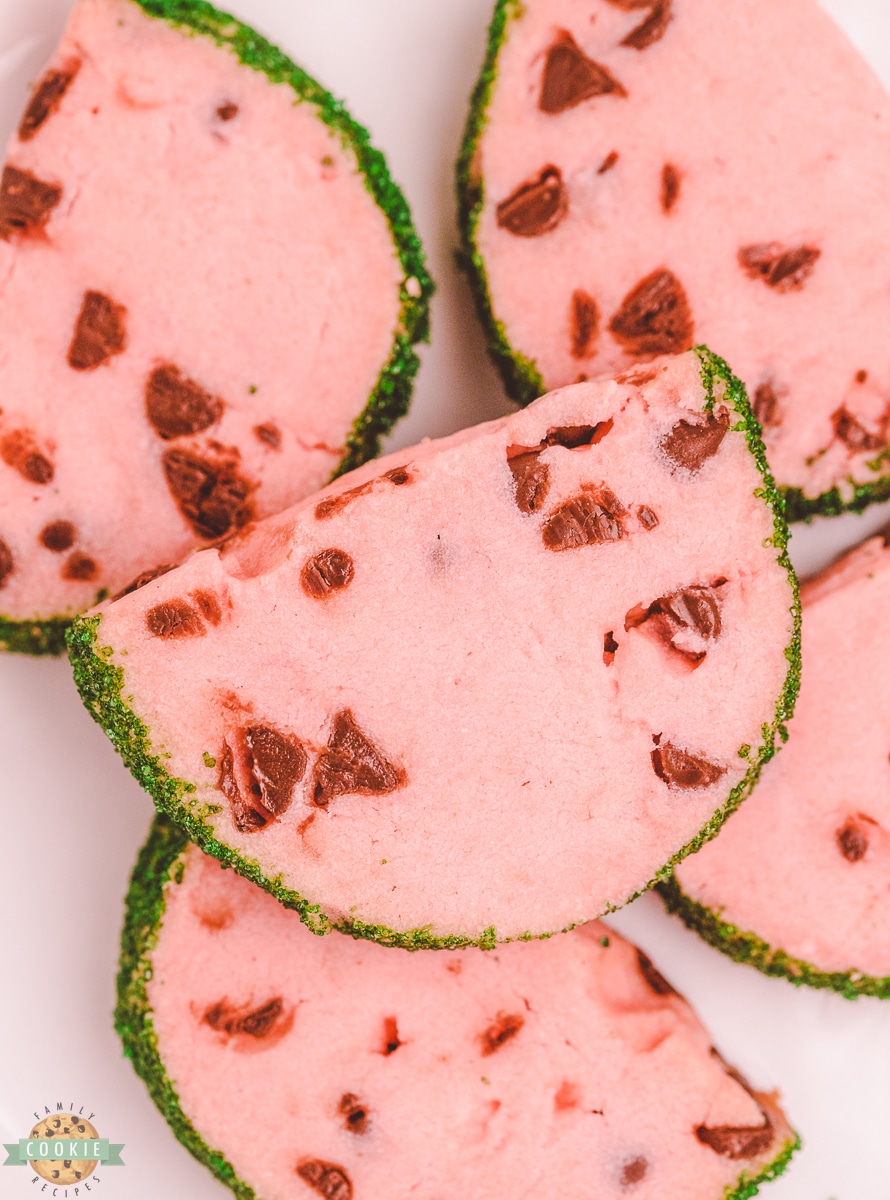 watermelon butter cookies with mini chocolate chip seeds and green sprinkle rind