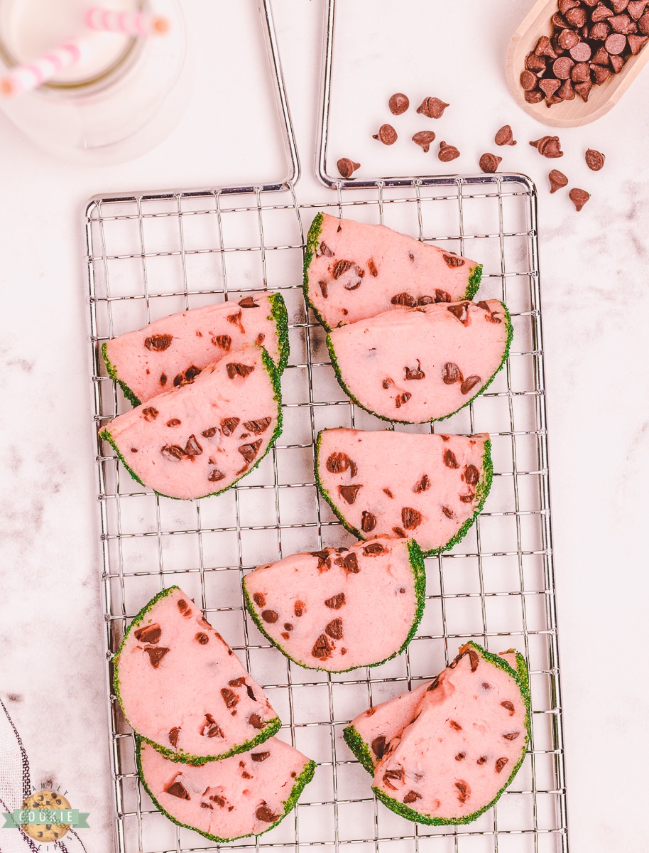 slice and bake butter cookies made to look like watermelon slices on a cooling rack