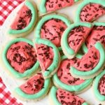 Watermelon Sugar Cookies made easy with sugar cookies, my favorite buttercream frosting and chocolate sprinkles. Perfect for summertime picnics when you can't get enough of watermelon in any form! 