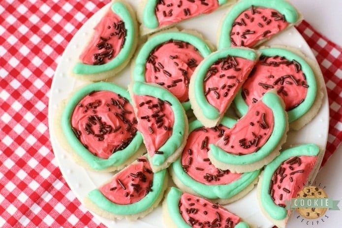 Watermelon Sugar Cookies made easy with sugar cookies, my favorite buttercream frosting and chocolate sprinkles. Perfect for summertime picnics when you can't get enough of watermelon in any form! 