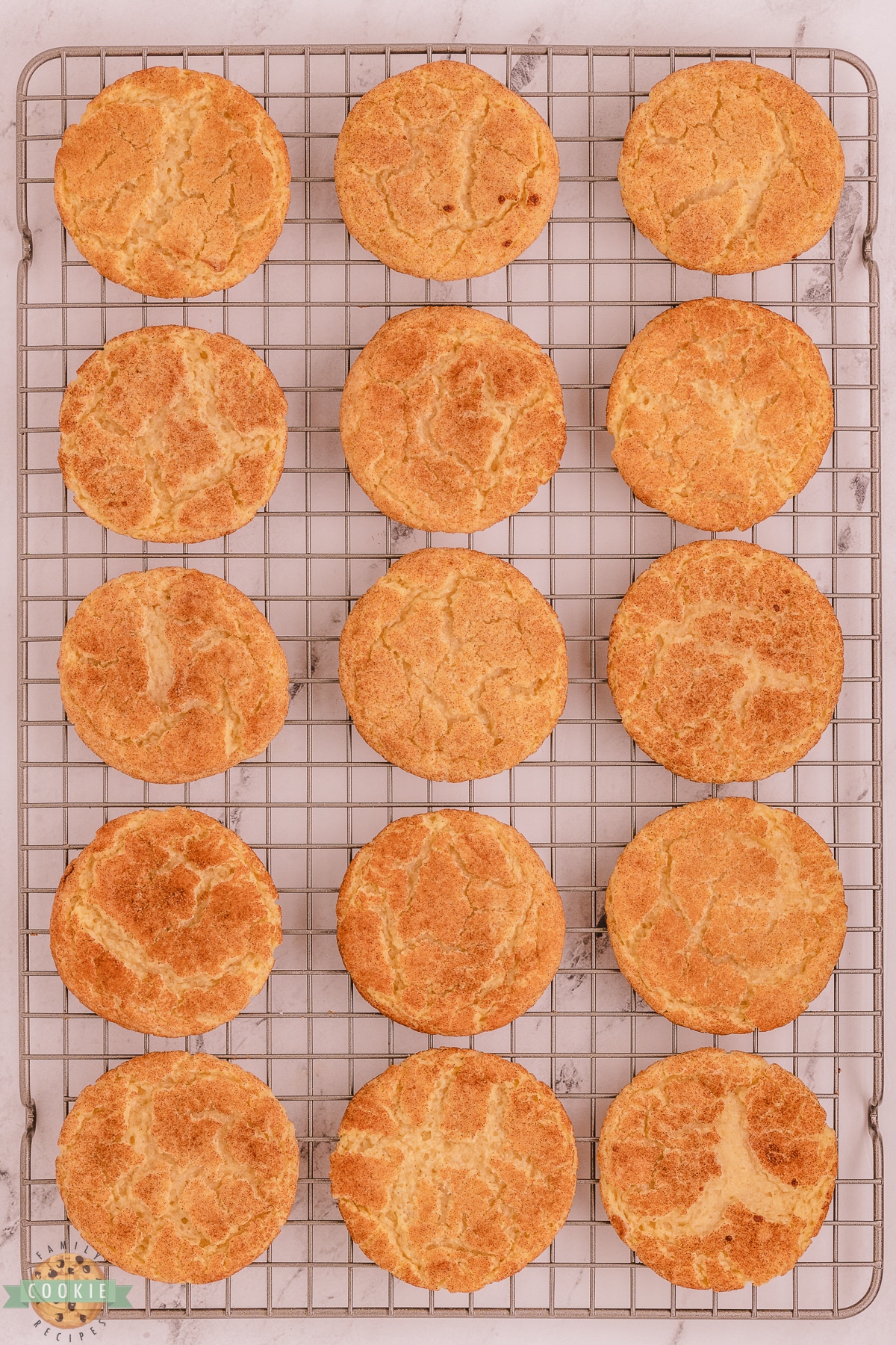 Snickerdoodle cookies on a cooling rack