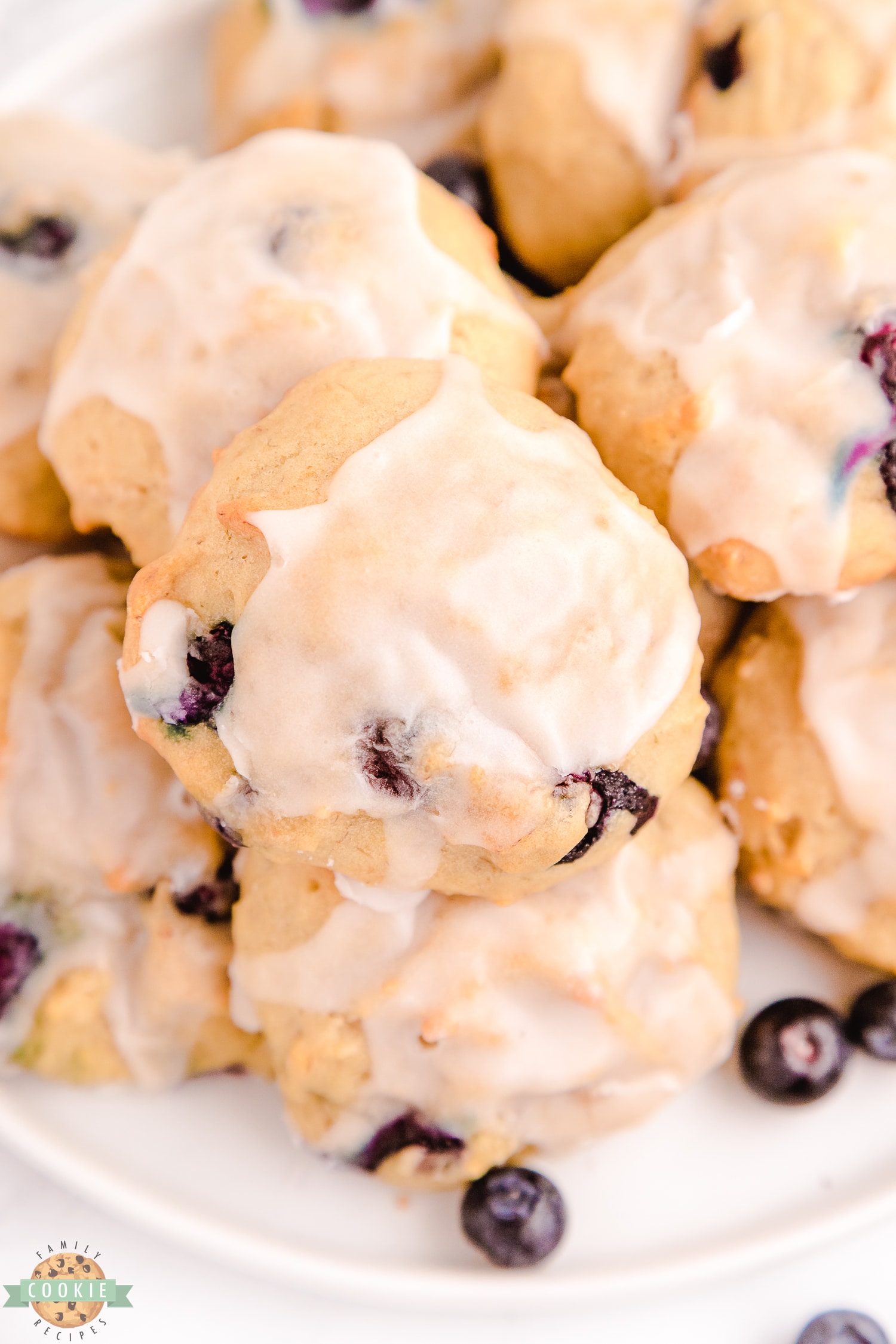 iced blueberry banana cookies on a plate