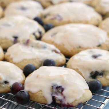 Blueberry Banana Cookies are like blueberry muffin tops in cookie form! Great flavor from the blueberries & bananas with a wonderful melt-in-your-mouth texture. Everyone goes crazy over these iced banana cookies!