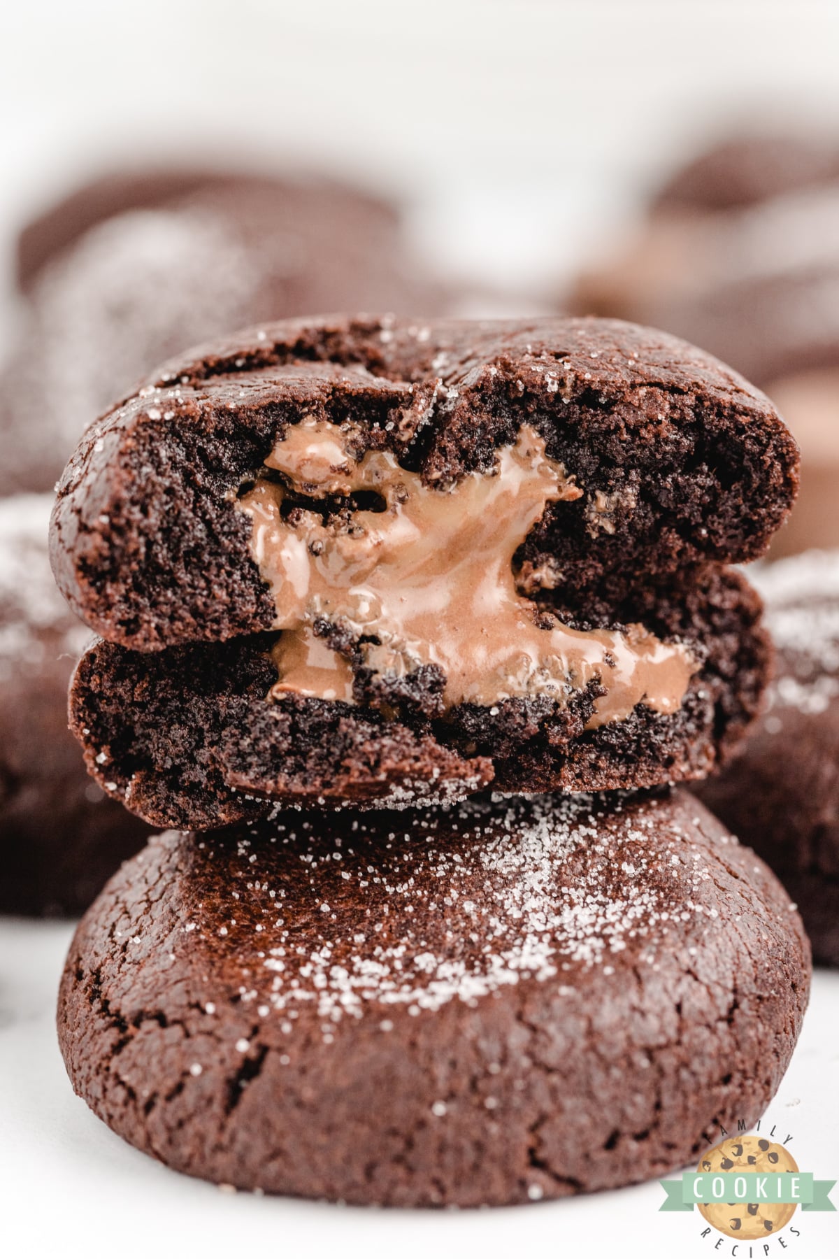Cake Mix Rolo Cookies are made with only 4 ingredients - one of which is the Rolo tucked in the middle! These cookies are so easy to make, and they are absolutely delicious with the gooey caramel centers.