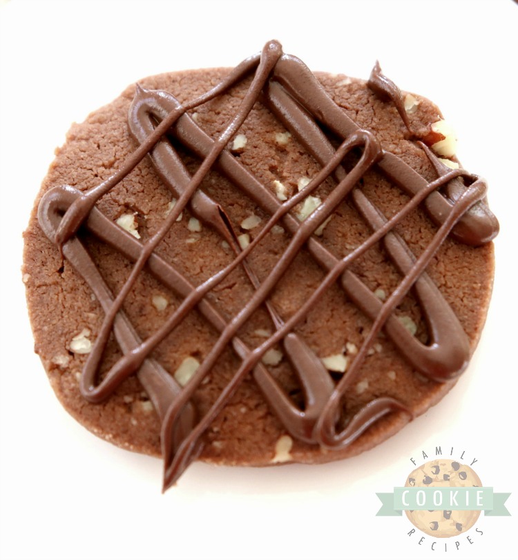 Chocolate Pecan Shortbread Cookies made by adding chopped pecans to our buttery chocolate shortbread then drizzling them with melted chocolate. These incredible shortbread cookies melt in your mouth and have the best chocolate flavor!