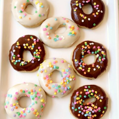 Glazed Donut Cookies are soft & pillowy donut-shaped cookies with a lovely chocolate or vanilla glaze & topped with sprinkles! Everything you love about donuts, only in cookie form!