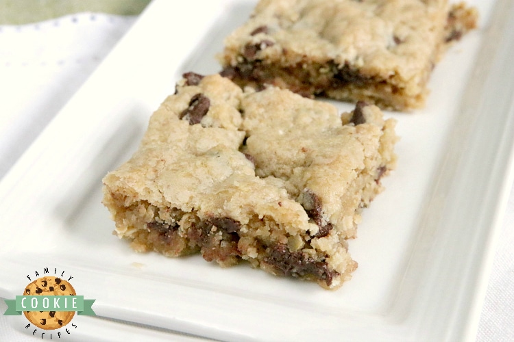 Oatmeal Chocolate Chip Cookie Bars are soft, chewy and easy to make when you don't have time to scoop individual cookies! This delicious cookie bar recipe is filled with oats and chocolate chips and comes together in just a few minutes.