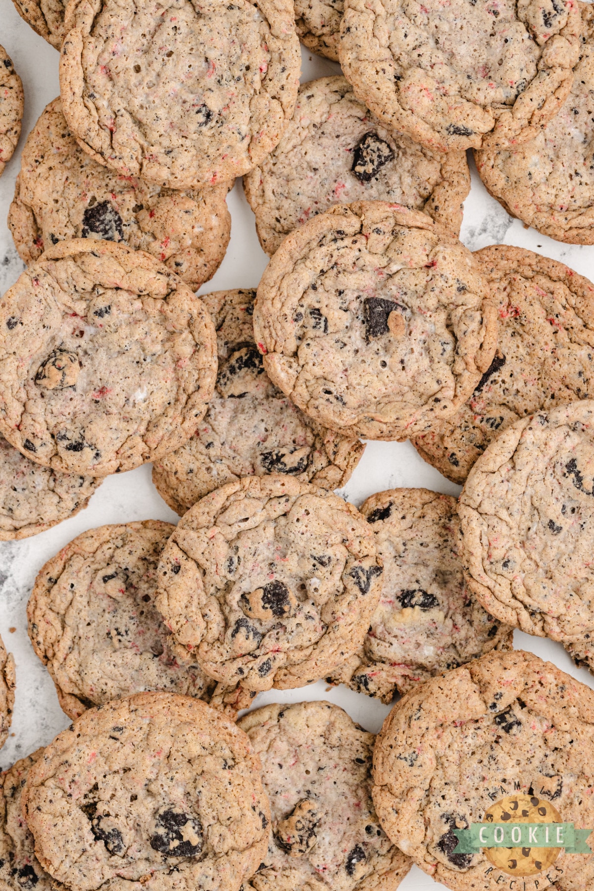 Peppermint Oreo Cookies are made with pudding mix, Oreo cookies, crushed candy canes and peppermint extract. This delicious peppermint cookie recipe yields a perfectly soft and chewy cookie that is sure to be a favorite holiday cookie!