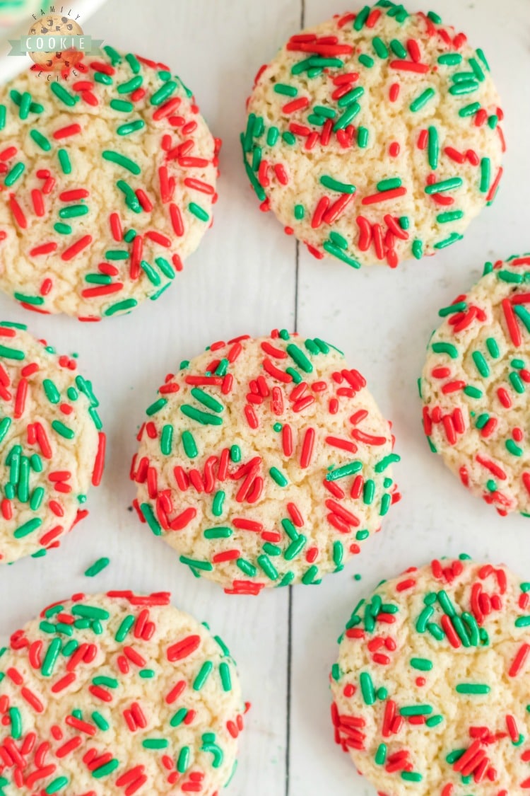 Christmas Sprinkle Cookies are sugar Cookies rolled in Christmas sprinkles for a special holiday treat! Delightfully soft & chewy Christmas cookies made with festive holiday sprinkles!