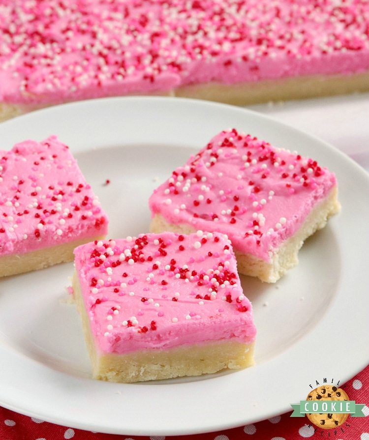 Sugar Cookie Bars are thick, soft and frosted with a delicious vanilla buttercream frosting. Simple sugar cookie recipe that is made in a pan and can be easily sliced and served.