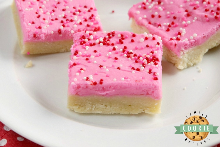 Sugar Cookie Bars are thick, soft and frosted with a delicious vanilla buttercream frosting. Simple sugar cookie recipe that is made in a pan and can be easily sliced and served.