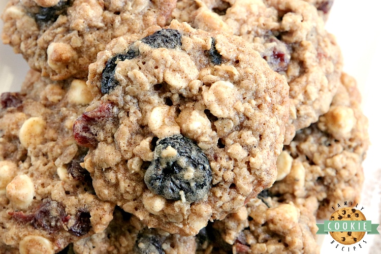 White Chocolate Cherry Oatmeal Cookies are made by adding white chocolate chips and dried cherries to the most amazing oatmeal cookie recipe ever! These cookies are soft and chewy and the flavors are incredible.