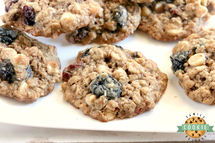 White Chocolate Cherry Oatmeal Cookies are made by adding white chocolate chips and dried cherries to the most amazing oatmeal cookie recipe ever! These cookies are soft and chewy and the flavors are incredible.