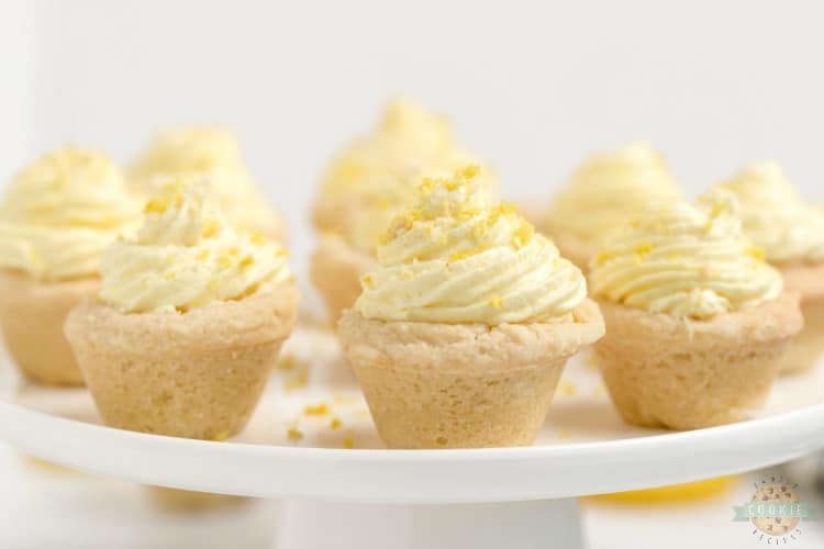 Lemon cream pie cookies are a delicious way to enjoy the tastes of a lemon cream pie without the hassle of pie crust. These lemon cookie cups are easy to grab and go and this lemon cookie recipe makes enough to share.