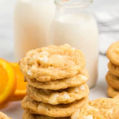 Orange Creamsicle Cookies are creamsicles in cookie form! Soft & chewy cookies with bright orange flavor and sweet white chocolate chips.