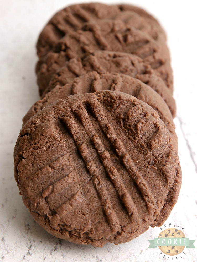 Chocolate Peanut Butter Cake Mix Cookies are soft, chewy and taste a little bit like peanut butter cups! Made with a chocolate cake mix, peanut butter, eggs and butter for a quick and easy cookie recipe.