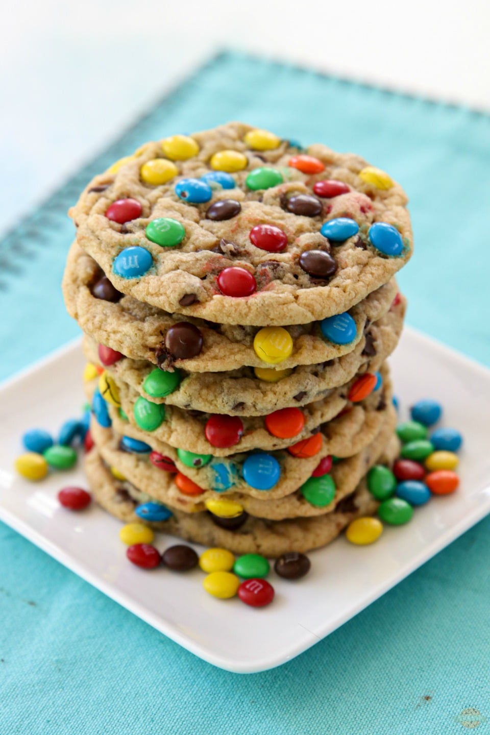 Soft & Chewy M&M Cookies made with butter, sugars, pudding mix & M&M's candy! Easy tip for coating your cookies PERFECTLY with M&M's! BEST M&M Cookie recipe ever! 