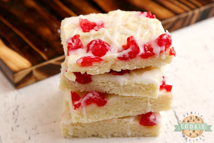 Sugar cookie bars topped with cherries and glaze