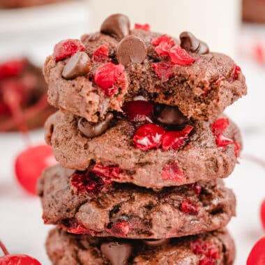 stack of cherry chocolate cookies with a bite taken out