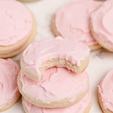 soft cream cheese sugar cookies with pink frosting