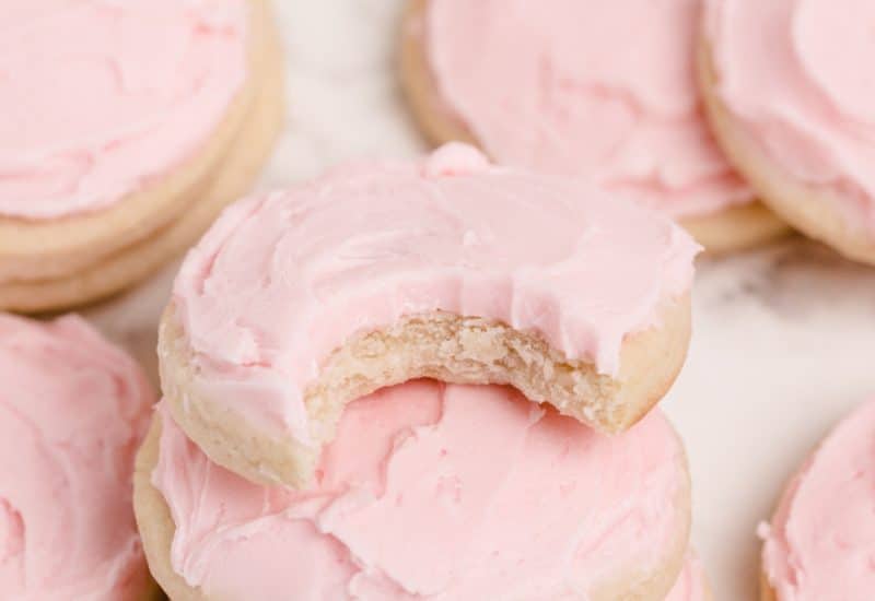 soft cream cheese sugar cookies with pink frosting