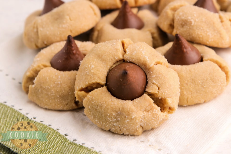 Cake Mix Peanut Butter Blossoms made with a cake mix, peanut butter and a Hershey kiss right in the middle. The easiest way to make Peanut Butter Blossom Cookies! 