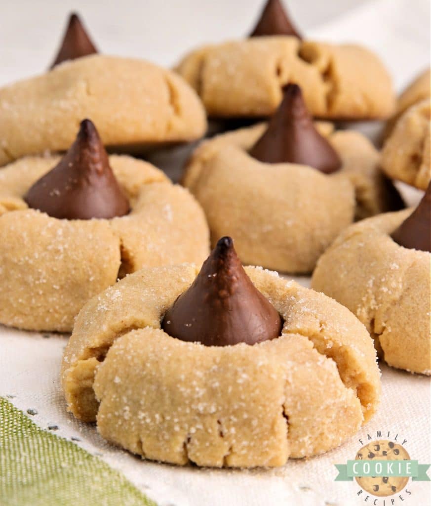 Cake Mix Peanut Butter Blossoms made with a cake mix, peanut butter and a Hershey kiss right in the middle. The easiest way to make Peanut Butter Blossom Cookies! 