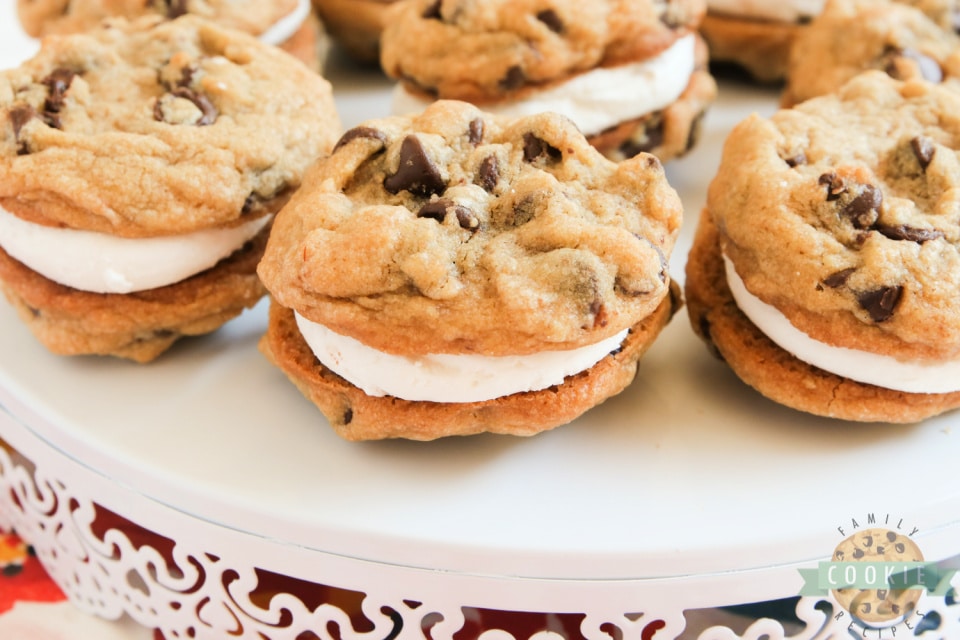 S'mores Cookie Sandwiches are made with graham cracker chocolate chip cookies and a simple marshmallow filling. Even if you don't love s'mores, you will love these cookie sandwiches!