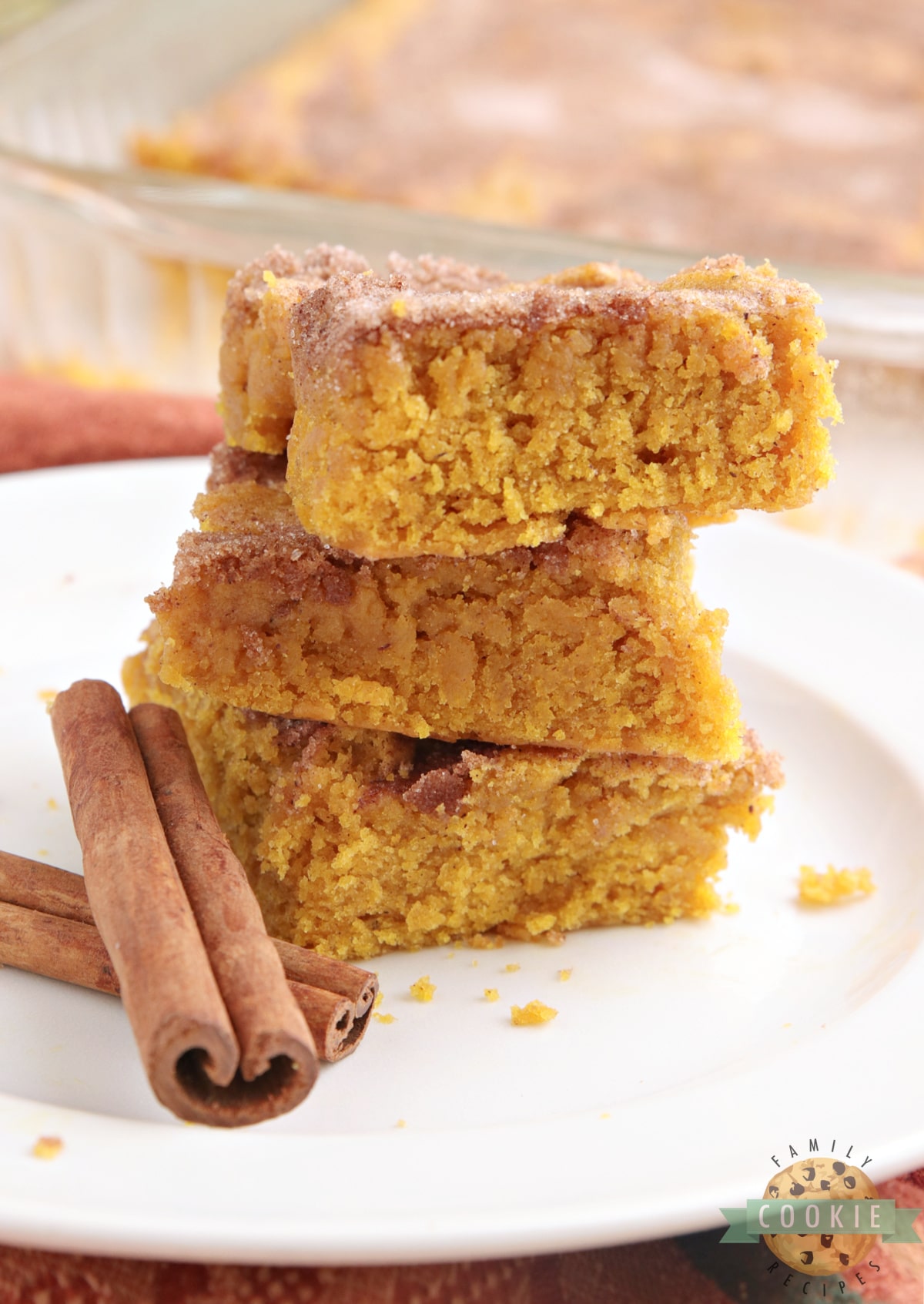 Pumpkin Snickerdoodle Cookie Bars coated with cinnamon and sugar on top