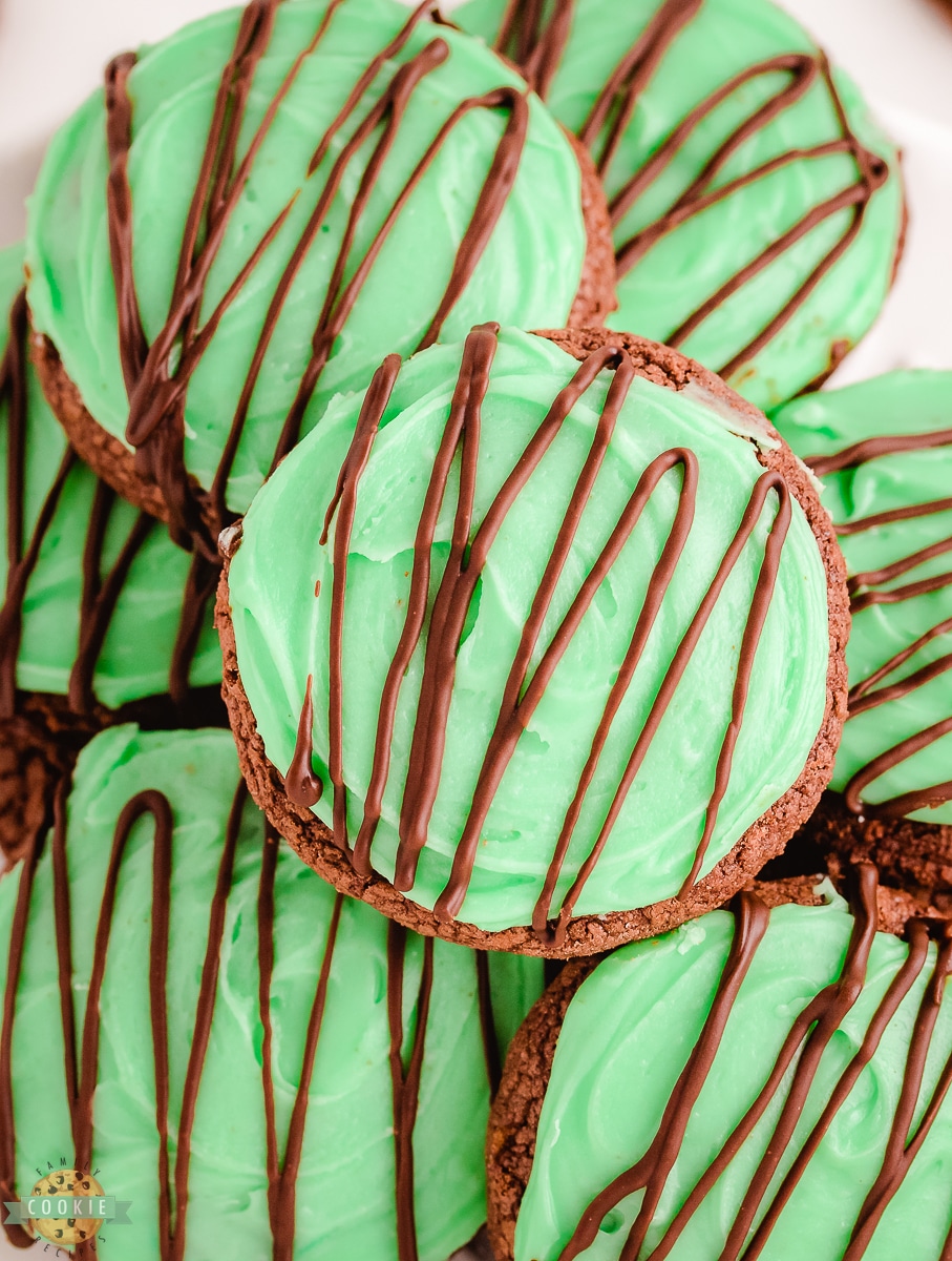 mint green cookies with chocolate drizzle