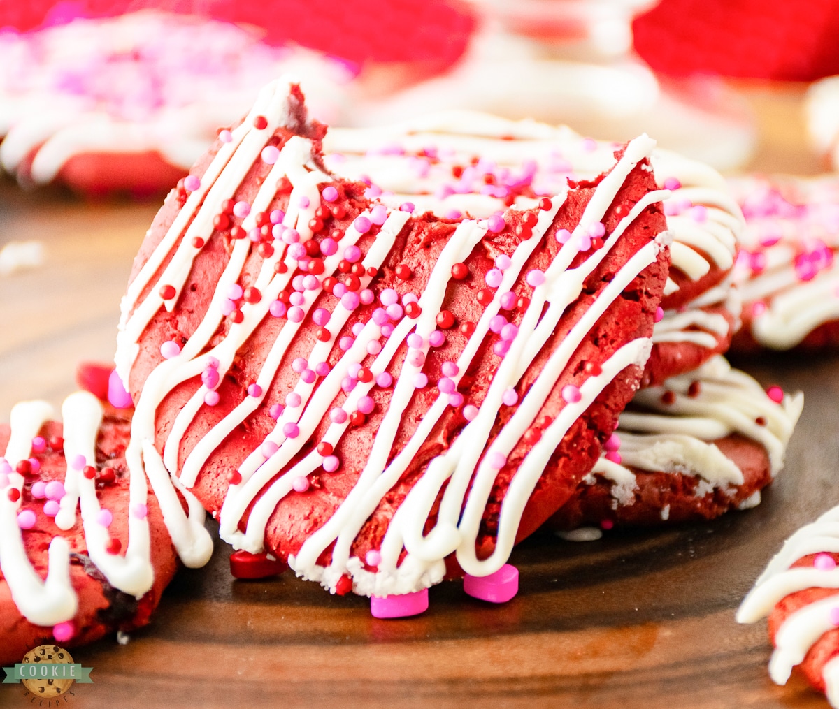 Red Velvet Cake mix cookies with Valentines sprinkles and a bite taken out