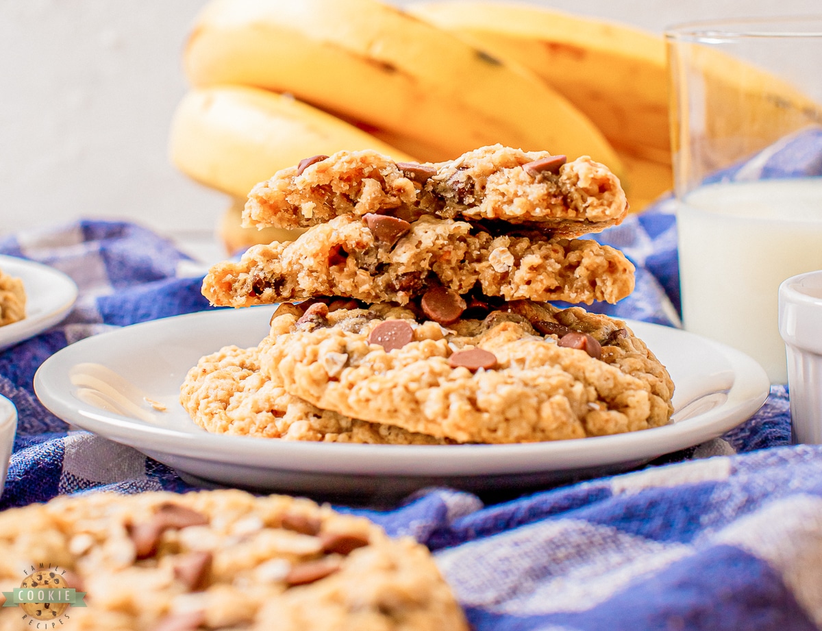 banana chocolate chip oatmeal cookies broken in half with melted chocolate