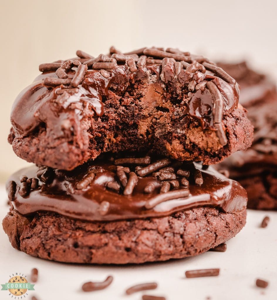 decadent chocolate brownie cookies with frosting and sprinkles