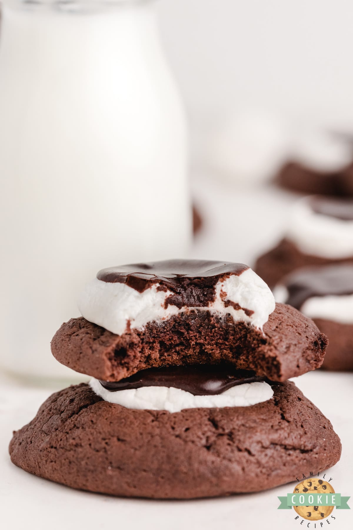 Thick chocolate cookies with marshmallows and chocolate frosting on top
