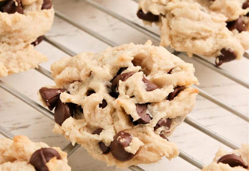 cream cheese chocolate chip cookies on a cooling rack