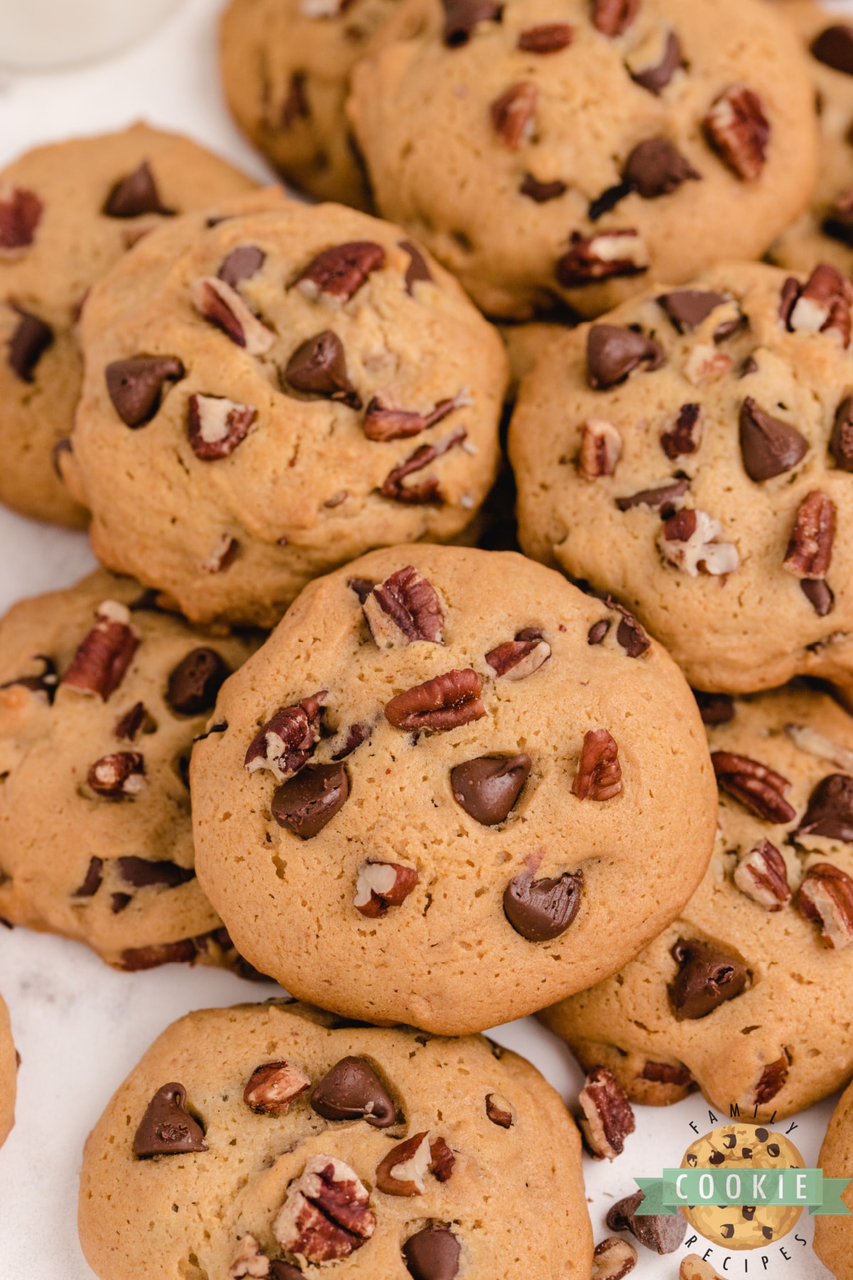 Honey Maple Chocolate Chip Cookies made with honey, maple syrup, pecans and chocolate chips. Amazingly flavorful and unique chocolate chip cookie recipe!