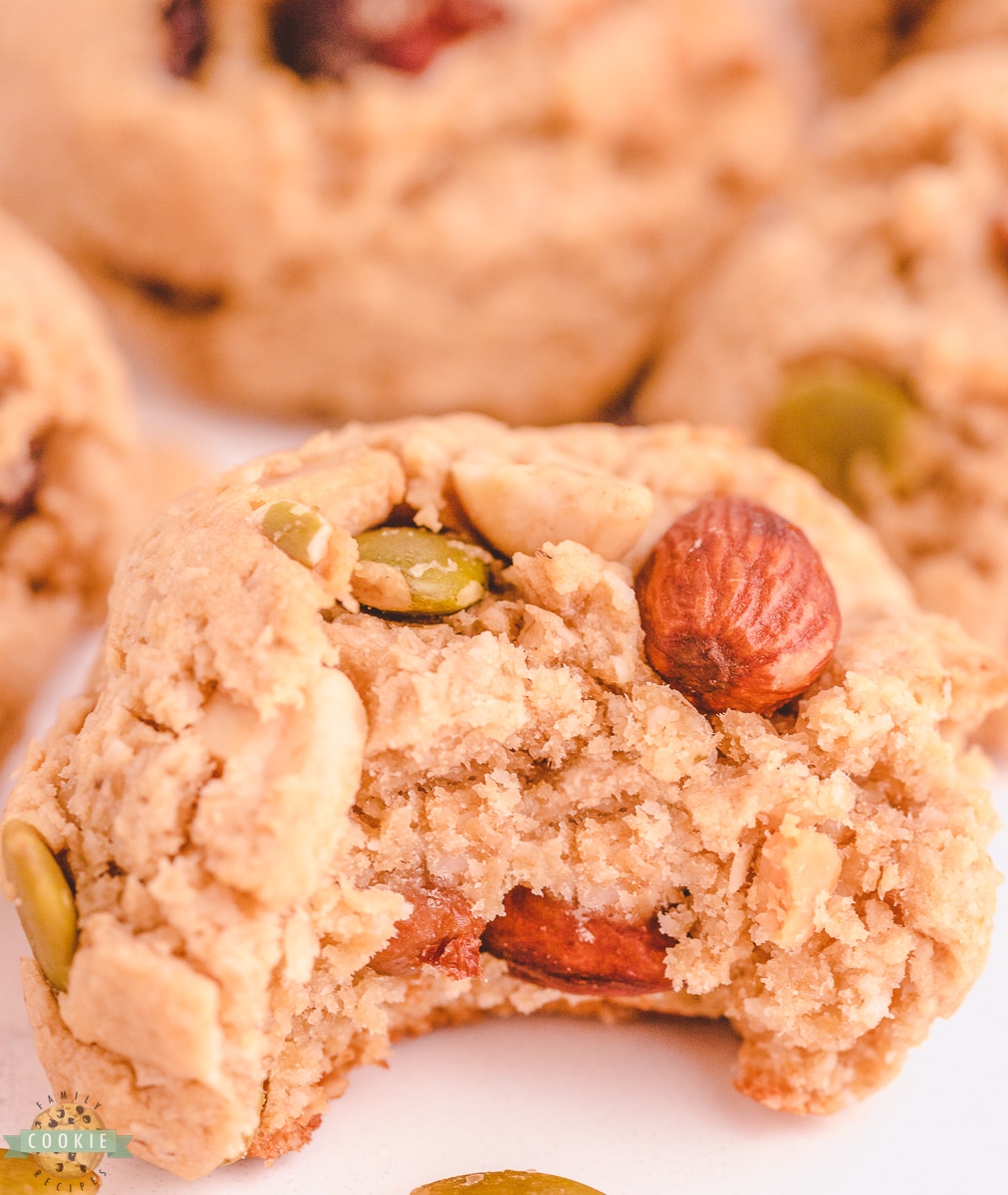 bite of a peanut butter cookie made with trail mix. 