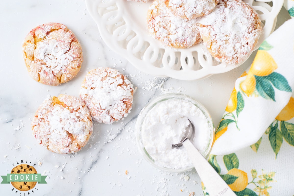 Strawberry Lemonade Cake Mix Cookies made with a lemon cake mix and freeze dried strawberries. Only 5 ingredients to make these soft crinkle cookies that are the perfect balance of tart and sweet.  