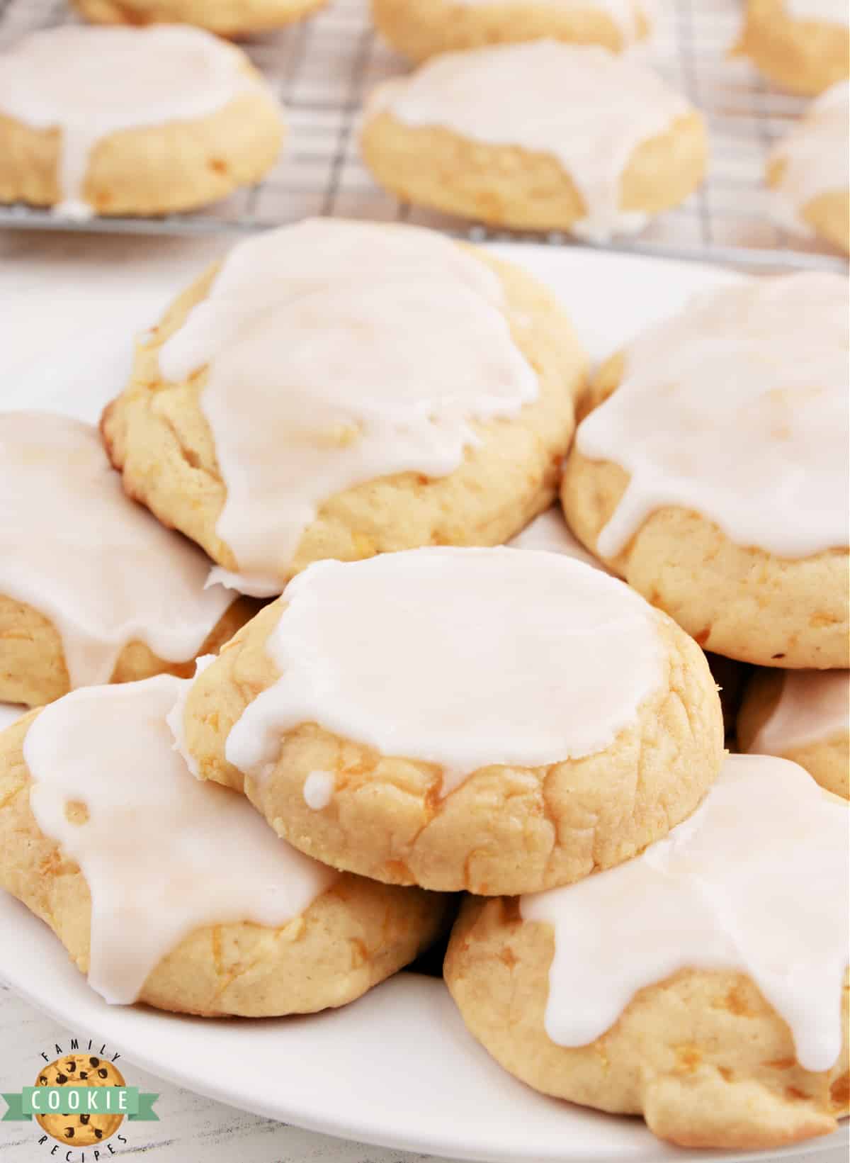 Glazed Mandarin Orange Cookies made with canned mandarin oranges and topped with a simple orange glaze. Simple cookie recipe with lots of orange flavor! 