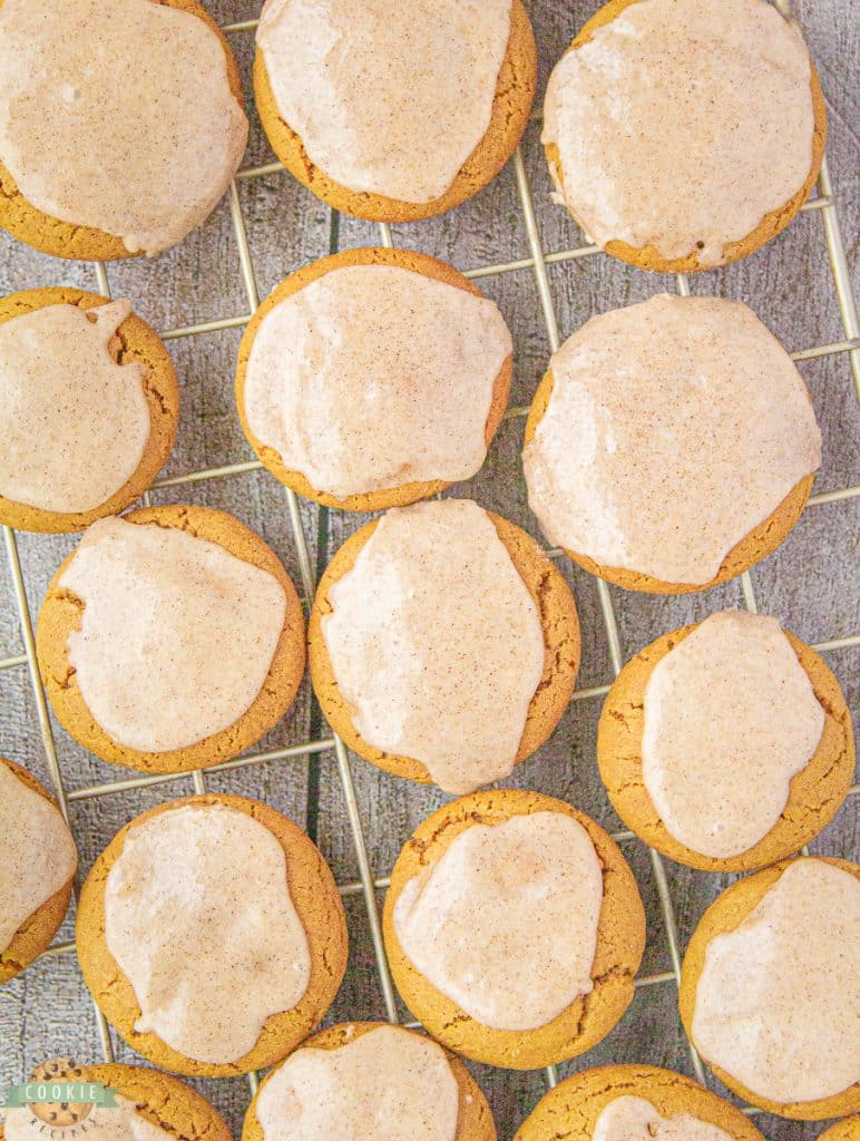 ginger molasses cookies on a cooling rack