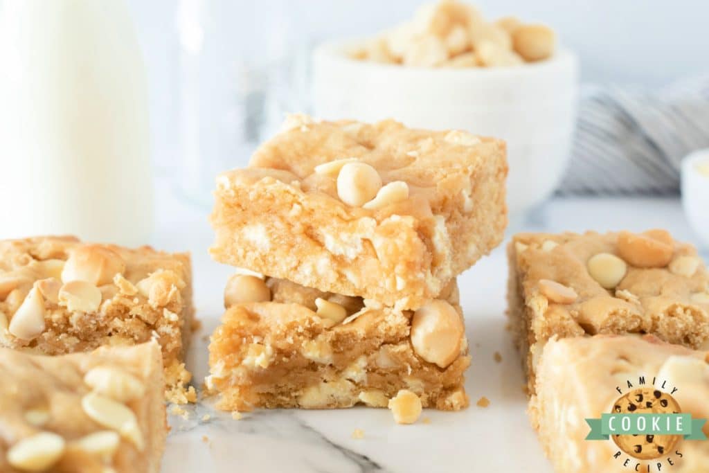Soft and chewy cookie bars with white chocolate chips and macadamia nuts