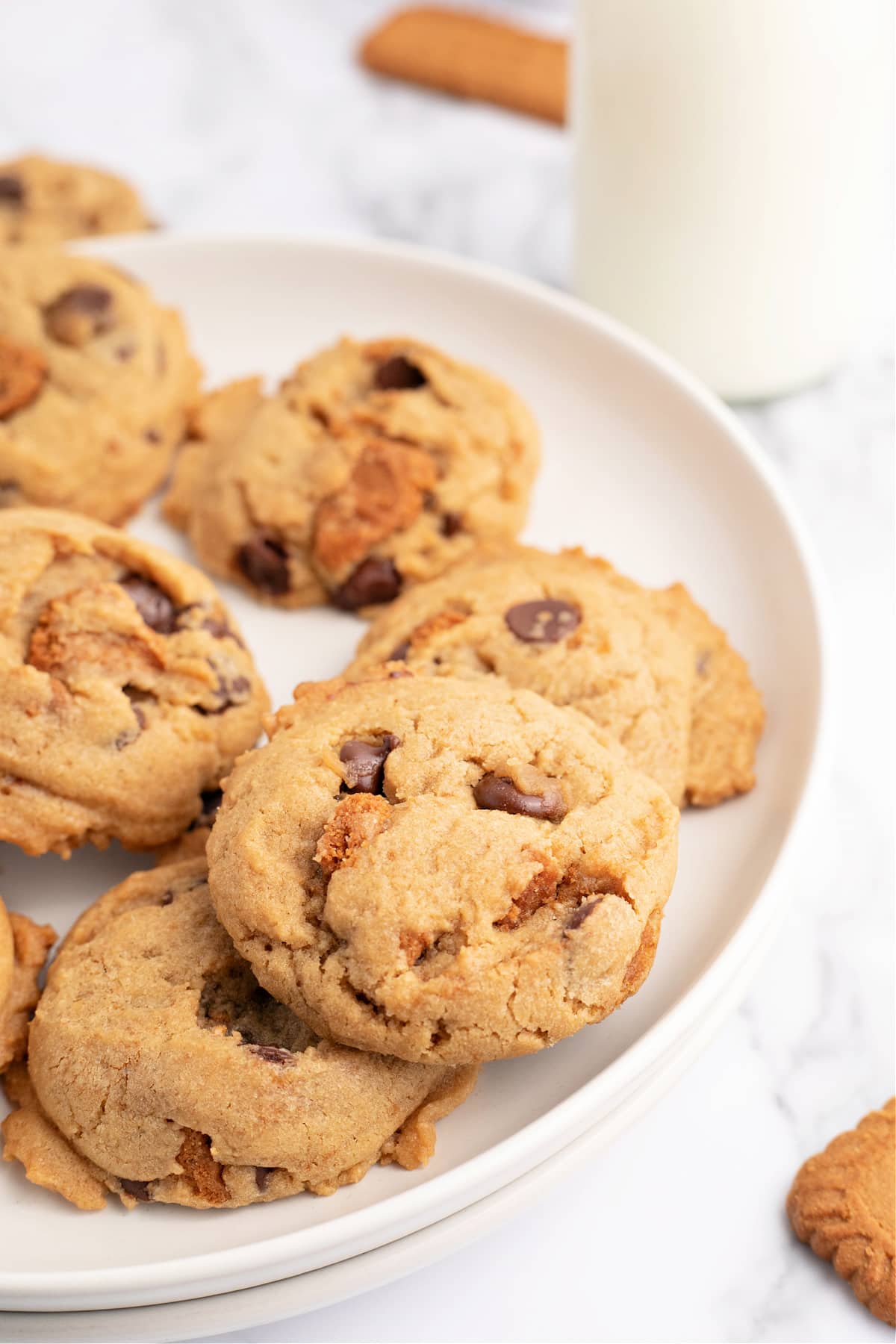 Biscoff Chocolate Chip Cookies are made with Biscoff spread and crumbled Biscoff cookies for a delicious twist on the classic chocolate chip cookie recipe. The cookie butter adds so much flavor to these soft and chewy cookies. 